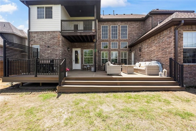 13 Dawn Hills Dr, Bentonville, AR 72712 - back of property featuring outdoor lounge area, a balcony, brick siding, and a yard