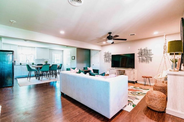 208 NW L St, Bentonville, AR 72712 - living room featuring ceiling fan, recessed lighting, and dark wood-style floors
