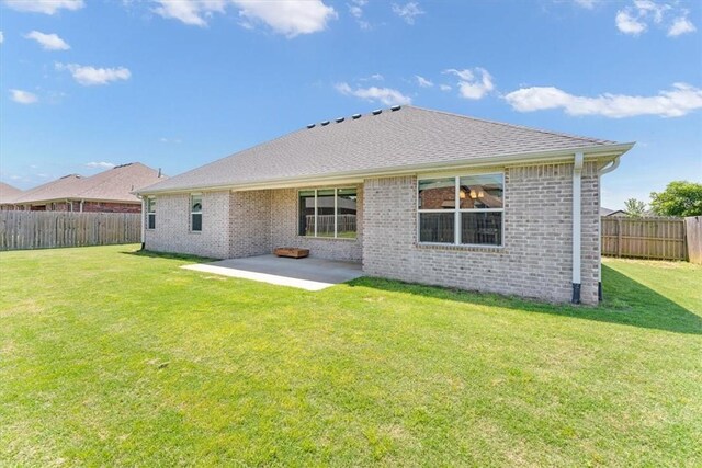 7326 Drury Ave, Springdale, AR 72762 - rear view of house featuring a patio and brick siding
