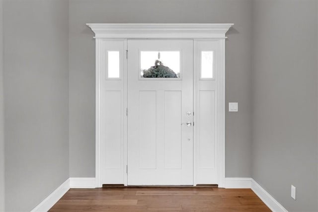 7326 Drury Ave, Springdale, AR 72762 - entryway with baseboards and wood finished floors