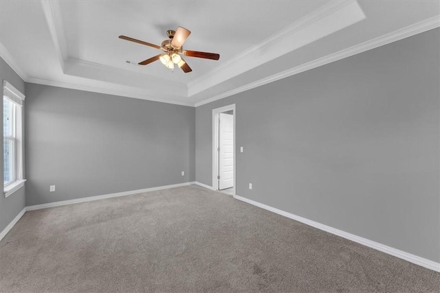 7326 Drury Ave, Springdale, AR 72762 - unfurnished room featuring a tray ceiling, ceiling fan, carpet floors, ornamental molding, and baseboards