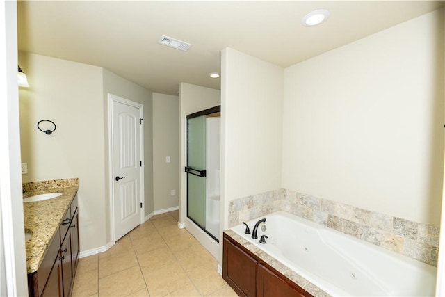 904 SW Caprington St, Bentonville, AR 72712 - bathroom with a whirlpool tub, vanity, tile patterned flooring, a shower stall, and baseboards
