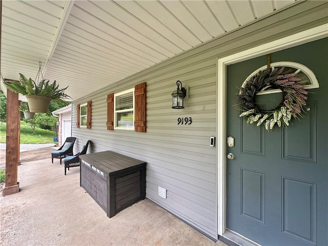 9193 Grimes Dr, Rogers, AR 72756 - entrance to property with covered porch