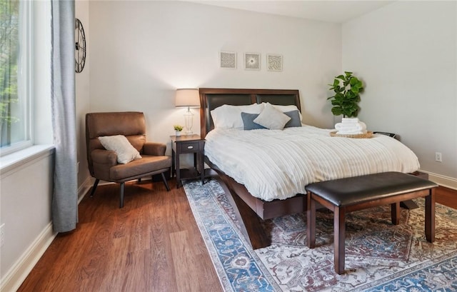 9193 Grimes Dr, Rogers, AR 72756 - bedroom featuring wood finished floors and baseboards