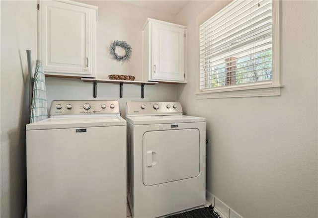 9193 Grimes Dr, Rogers, AR 72756 - laundry area with independent washer and dryer, cabinet space, and baseboards
