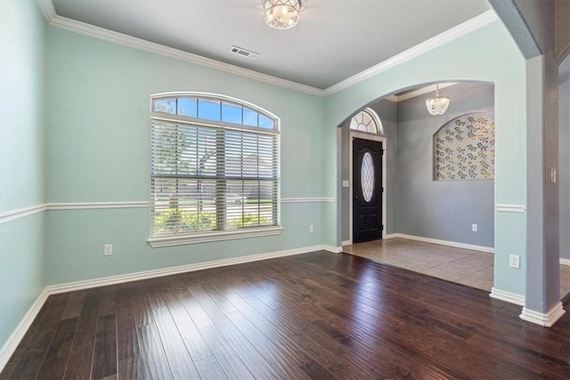 11029 Coleman Ct, Farmington, AR 72730 - entrance foyer featuring plenty of natural light, arched walkways, hardwood / wood-style flooring, and crown molding