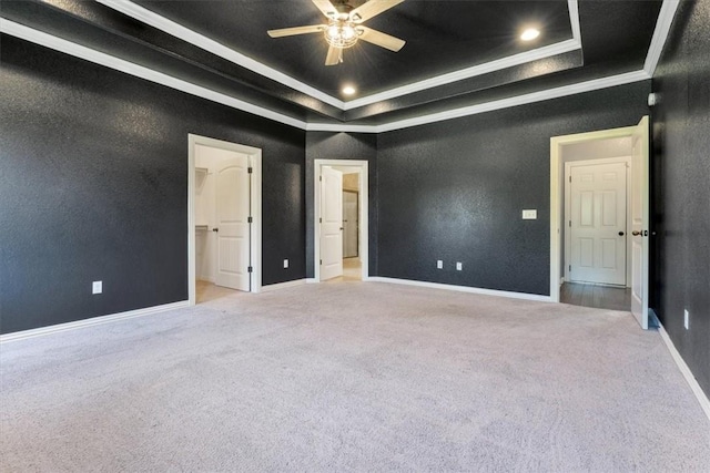 11029 Coleman Ct, Farmington, AR 72730 - unfurnished bedroom featuring a raised ceiling, light colored carpet, crown molding, baseboards, and ceiling fan