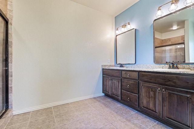 11029 Coleman Ct, Farmington, AR 72730 - bathroom with a shower stall, double vanity, tile patterned floors, and baseboards