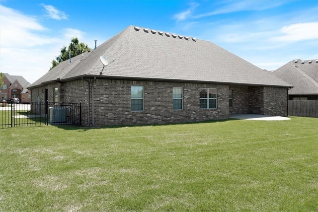11029 Coleman Ct, Farmington, AR 72730 - rear view of property with brick siding, a patio, and a shingled roof