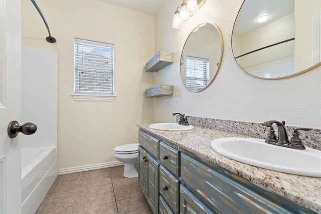 11029 Coleman Ct, Farmington, AR 72730 - full bath with double vanity, shower / bath combination, tile patterned floors, toilet, and baseboards