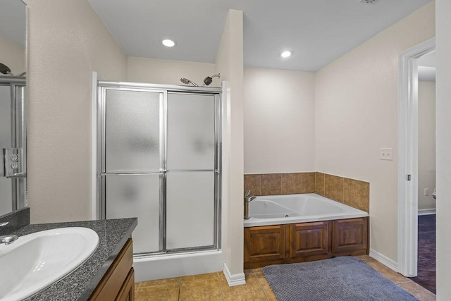 340 Mckissic Spring Rd, Centerton, AR 72719 - full bath with a shower stall, vanity, a bath, and tile patterned flooring