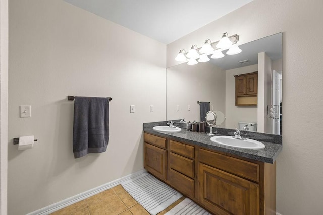 340 Mckissic Spring Rd, Centerton, AR 72719 - full bath featuring double vanity, baseboards, and tile patterned floors
