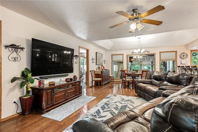 12 Drayton Ln, Bella Vista, AR 72715 - living area featuring a chandelier, ceiling fan, light wood-style floors, a textured ceiling, and baseboards