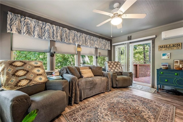 12 Drayton Ln, Bella Vista, AR 72715 - living room with ceiling fan, a wall mounted AC, wood finished floors, and crown molding