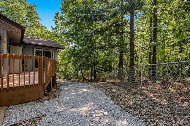 12 Drayton Ln, Bella Vista, AR 72715 - view of yard featuring a wooden deck