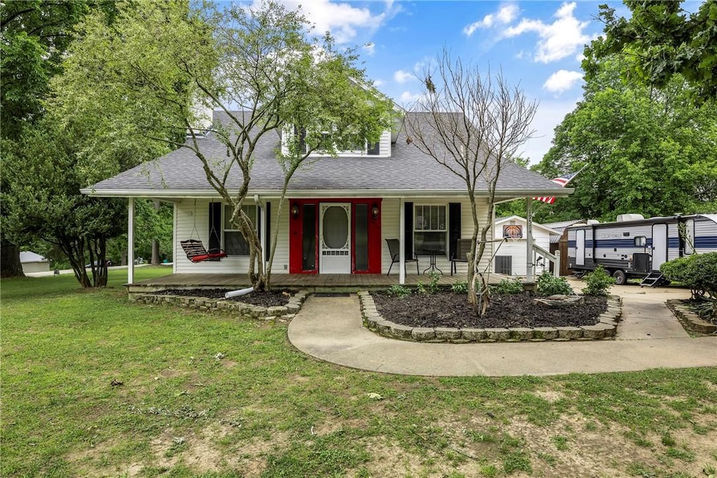 19574 Sonora Rd, Springdale, AR 72764 - view of front of house with a porch, a front yard, and roof with shingles