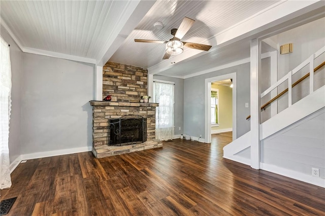 19574 Sonora Rd, Springdale, AR 72764 - unfurnished living room with a ceiling fan, a stone fireplace, wood finished floors, baseboards, and crown molding
