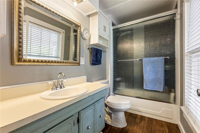 19574 Sonora Rd, Springdale, AR 72764 - full bath with vanity, enclosed tub / shower combo, toilet, and wood finished floors