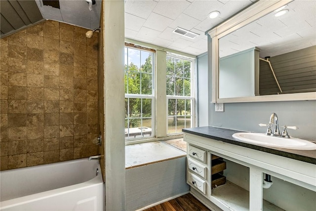 19574 Sonora Rd, Springdale, AR 72764 - full bathroom with shower / bathtub combination, wood finished floors, and vanity