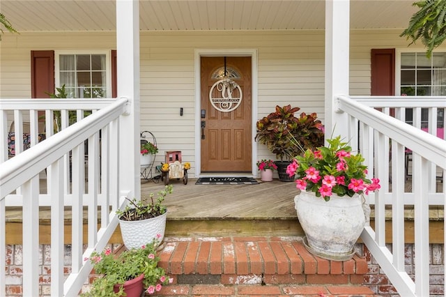 1525 Meadow Ct, Green Forest, AR 72638 - doorway to property featuring covered porch