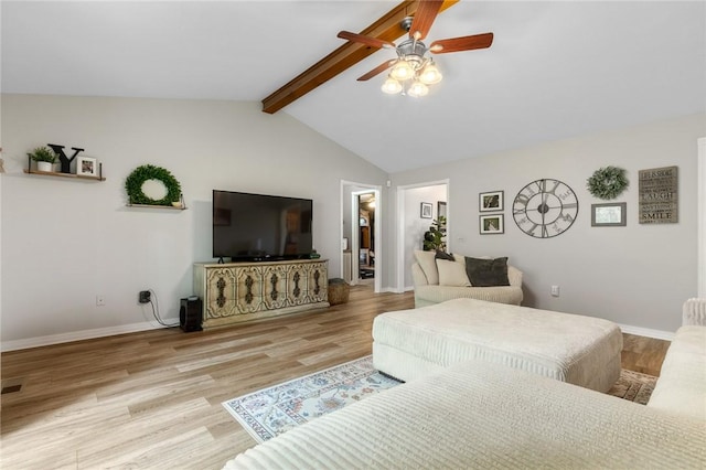 1525 Meadow Ct, Green Forest, AR 72638 - living area featuring a ceiling fan, wood finished floors, and baseboards