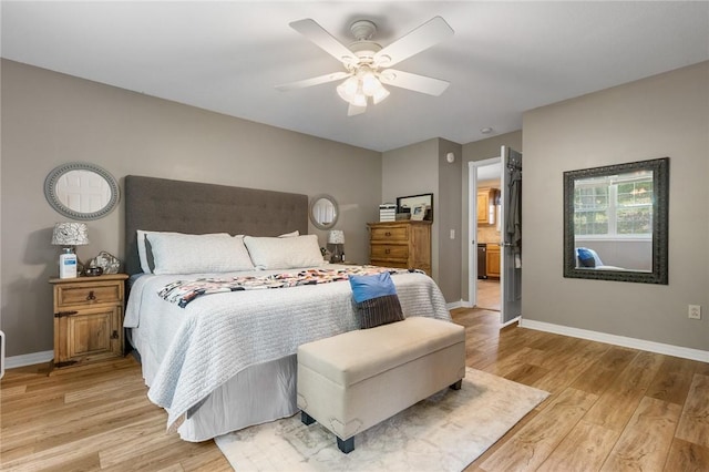 1525 Meadow Ct, Green Forest, AR 72638 - bedroom featuring light wood-style flooring, baseboards, and a ceiling fan