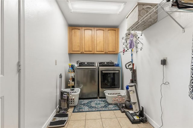 1525 Meadow Ct, Green Forest, AR 72638 - washroom featuring cabinet space, washer and dryer, tile patterned floors, and attic access