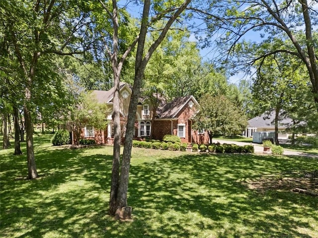 1325 Avery Pl, Siloam Springs, AR 72761 - view of front of home with a front lawn and brick siding