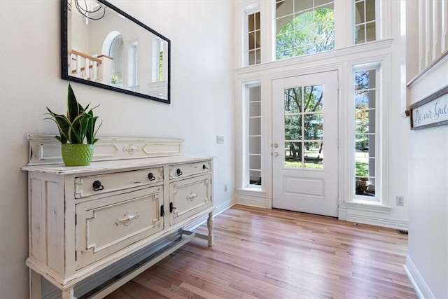 1325 Avery Pl, Siloam Springs, AR 72761 - entrance foyer featuring light wood-style flooring and baseboards