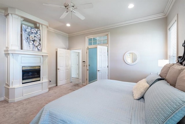 1325 Avery Pl, Siloam Springs, AR 72761 - bedroom with light colored carpet, ornamental molding, recessed lighting, baseboards, and a glass covered fireplace