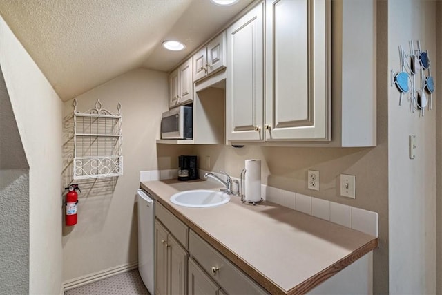1325 Avery Pl, Siloam Springs, AR 72761 - bathroom with vanity, a textured ceiling, baseboards, vaulted ceiling, and recessed lighting