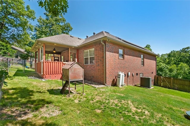 8 Allonby Cir, Bella Vista, AR 72714 - back of house with a gate, central AC unit, a ceiling fan, brick siding, and a deck