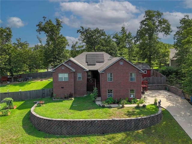 8 Allonby Cir, Bella Vista, AR 72714 - back of house featuring solar panels and brick siding