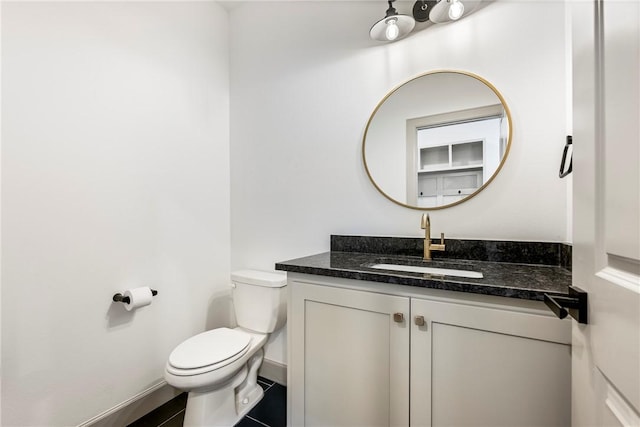 839 Saffron Ave, Tontitown, AR 72762 - bathroom featuring vanity, toilet, and baseboards