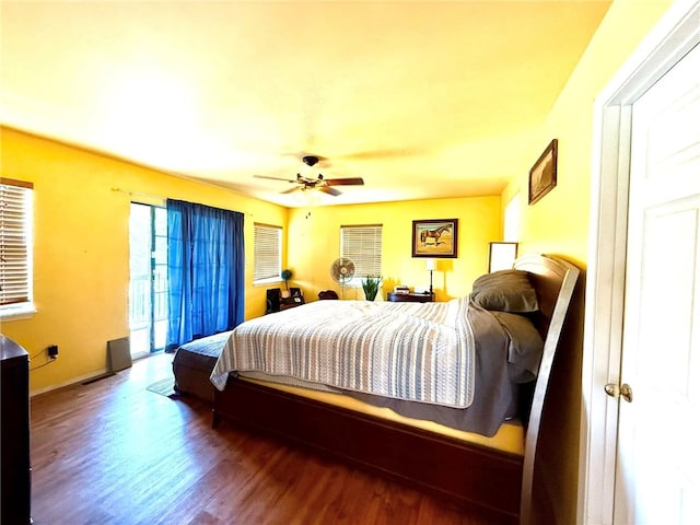 12088 State Highway 28, Dardanelle, AR 72834 - bedroom with wood finished floors, access to exterior, ceiling fan, and baseboards