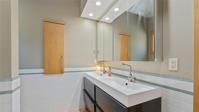 1806 Best Friend Ln, Fayetteville, AR 72704 - bathroom with tile walls, double vanity, recessed lighting, and a wainscoted wall