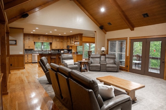 8295 Ridgecrest Ln, Rogers, AR 72756 - living room featuring high vaulted ceiling, recessed lighting, light wood-style flooring, wooden ceiling with exposed beams, and french doors