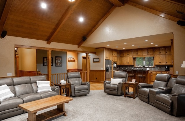 8295 Ridgecrest Ln, Rogers, AR 72756 - living room with high vaulted ceiling, wood ceiling with exposed beams, recessed lighting, light colored carpet, and a wainscoted wall