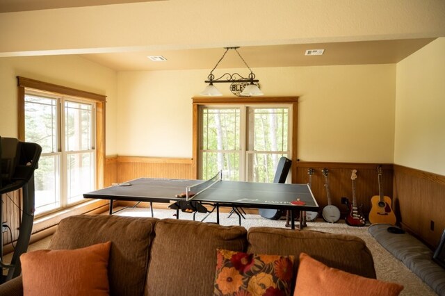8295 Ridgecrest Ln, Rogers, AR 72756 - playroom featuring a wainscoted wall, wooden walls, and carpet