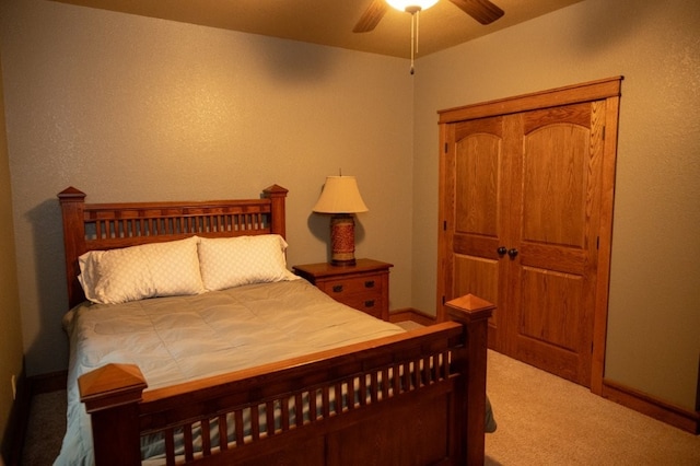 8295 Ridgecrest Ln, Rogers, AR 72756 - bedroom with carpet floors, ceiling fan, baseboards, and a closet