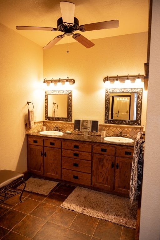 8295 Ridgecrest Ln, Rogers, AR 72756 - full bathroom with tile patterned flooring, double vanity, tasteful backsplash, and ceiling fan