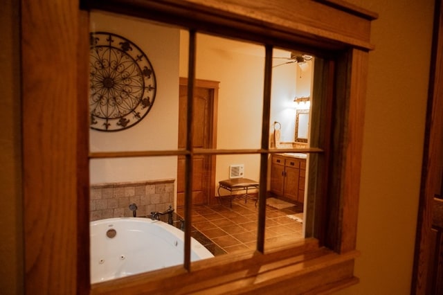 8295 Ridgecrest Ln, Rogers, AR 72756 - bathroom featuring a jetted tub and ceiling fan