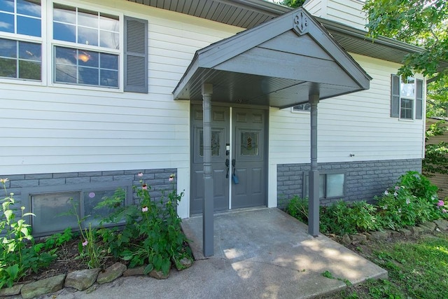 1103 NW 10th St, Bentonville, AR 72712 - view of exterior entry featuring a chimney