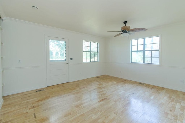 1103 NW 10th St, Bentonville, AR 72712 - unfurnished room featuring crown molding, ceiling fan, and wood finished floors