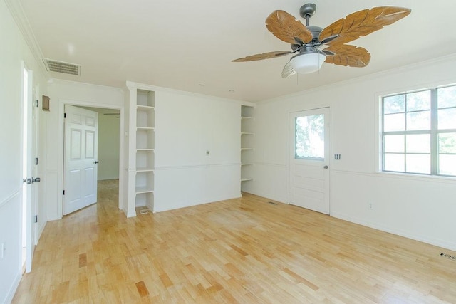 1103 NW 10th St, Bentonville, AR 72712 - unfurnished room with light wood-style flooring, ornamental molding, ceiling fan, and built in shelves
