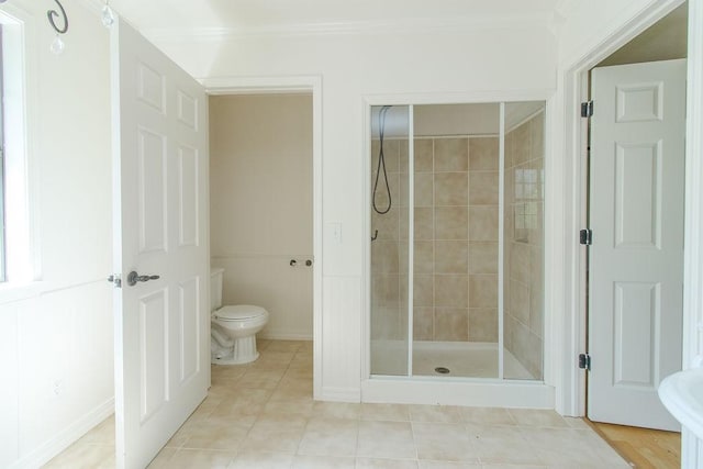 1103 NW 10th St, Bentonville, AR 72712 - full bathroom featuring ornamental molding, a stall shower, and tile patterned floors
