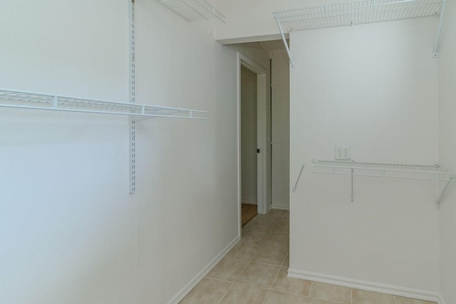 1103 NW 10th St, Bentonville, AR 72712 - spacious closet featuring light tile patterned floors