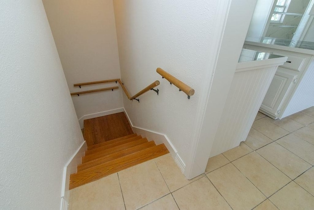 1103 NW 10th St, Bentonville, AR 72712 - stairs featuring tile patterned floors
