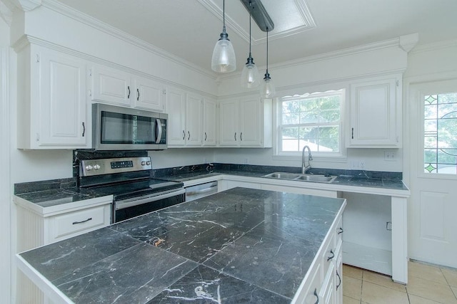 1103 NW 10th St, Bentonville, AR 72712 - kitchen with appliances with stainless steel finishes, white cabinets, ornamental molding, a center island, and decorative light fixtures