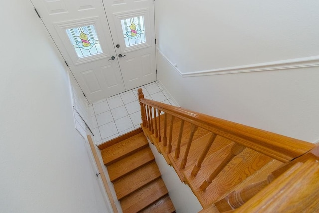1103 NW 10th St, Bentonville, AR 72712 - staircase featuring tile patterned floors